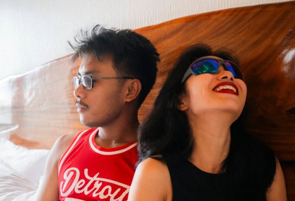 Two people wearing glasses